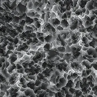 Microscopic texture of a treated dental implant surface
